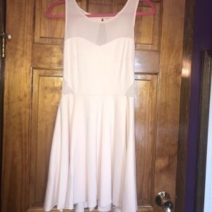 A light pink skater dress.